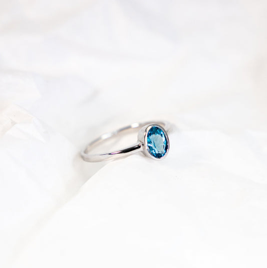 Blue Topaz Oval Solitaire Ring